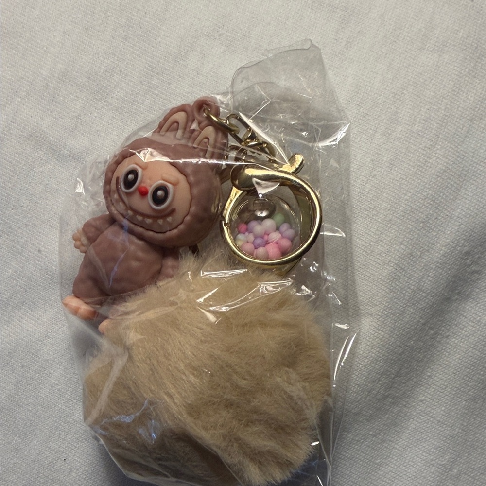 Cute Brown Animal Keychain with Pom Pom